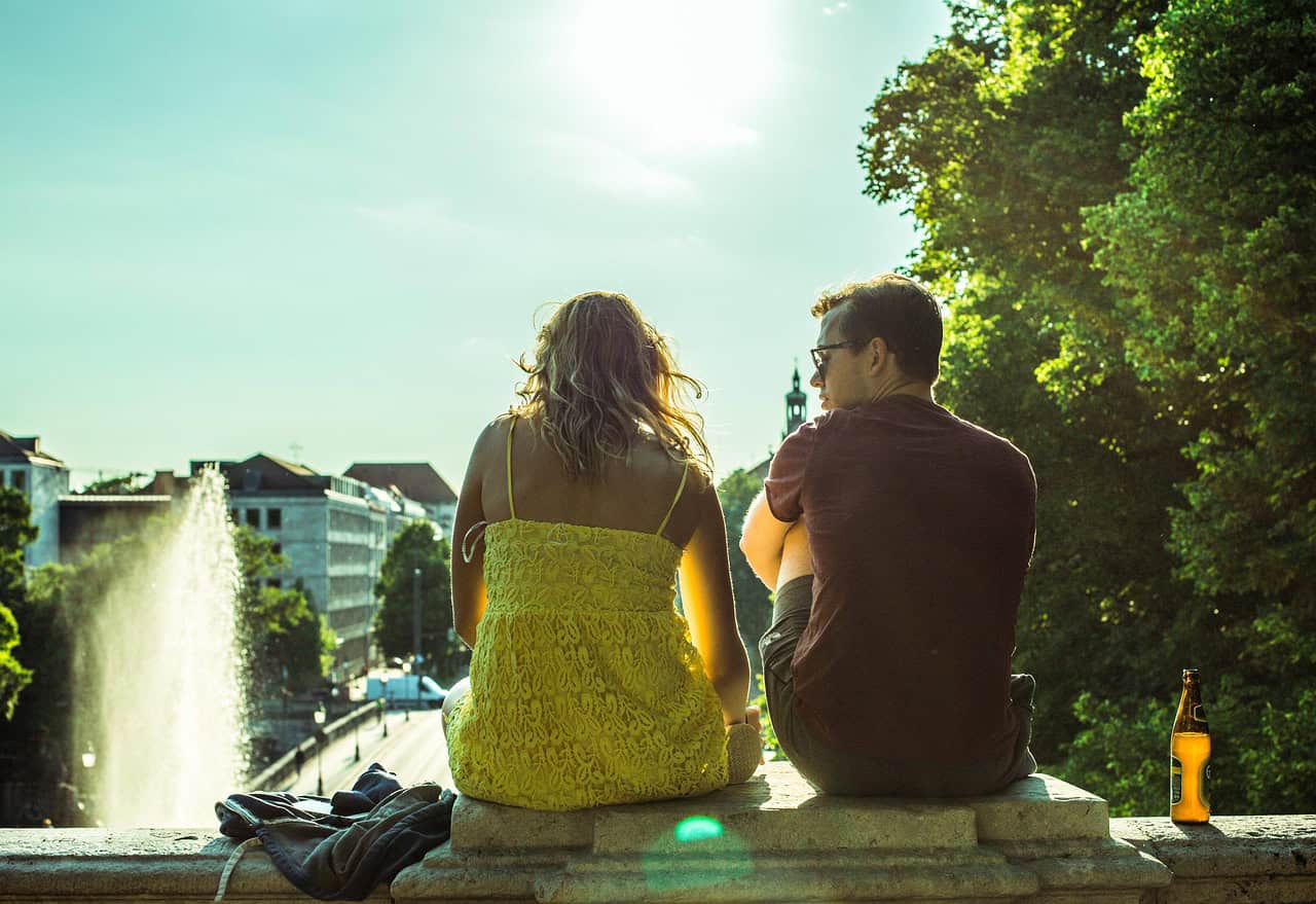 Sunset couple enjoying a peaceful moment in the park, capturing life's beautiful moments with friends and loved ones.